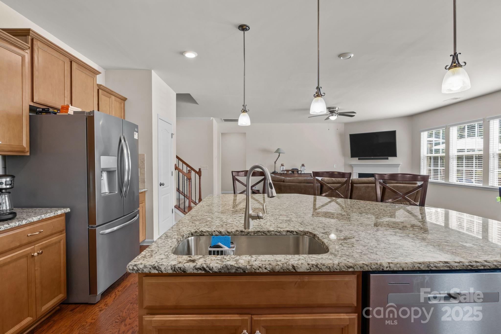 15925 Foreleigh Road Huntersville, NC 28078 - Photo 15 of 48 a kitchen with stainless steel appliances granite countertop a refrigerator a sink and a stove
