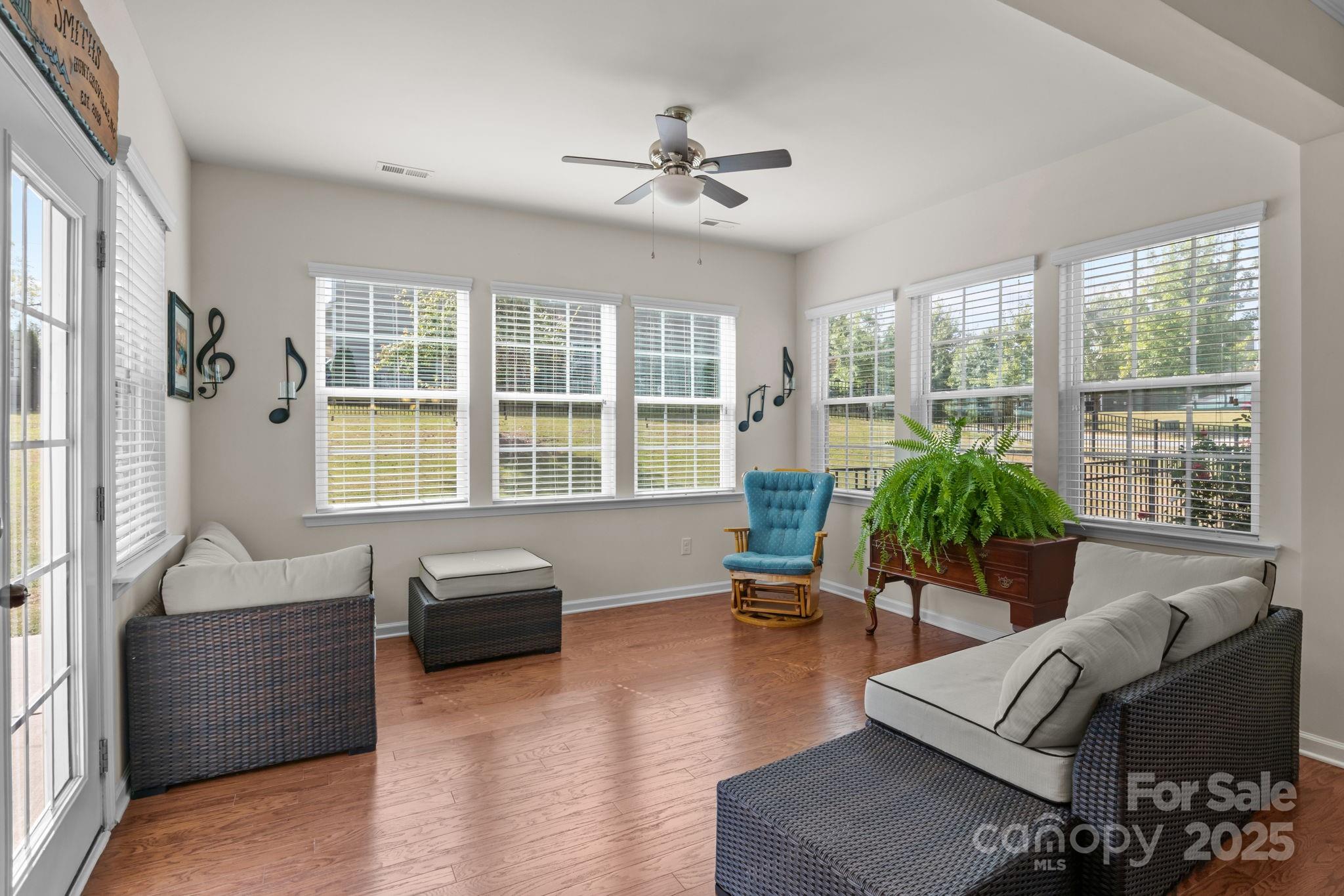 15925 Foreleigh Road Huntersville, NC 28078 - Photo 19 of 48 a living room with furniture and a large window
