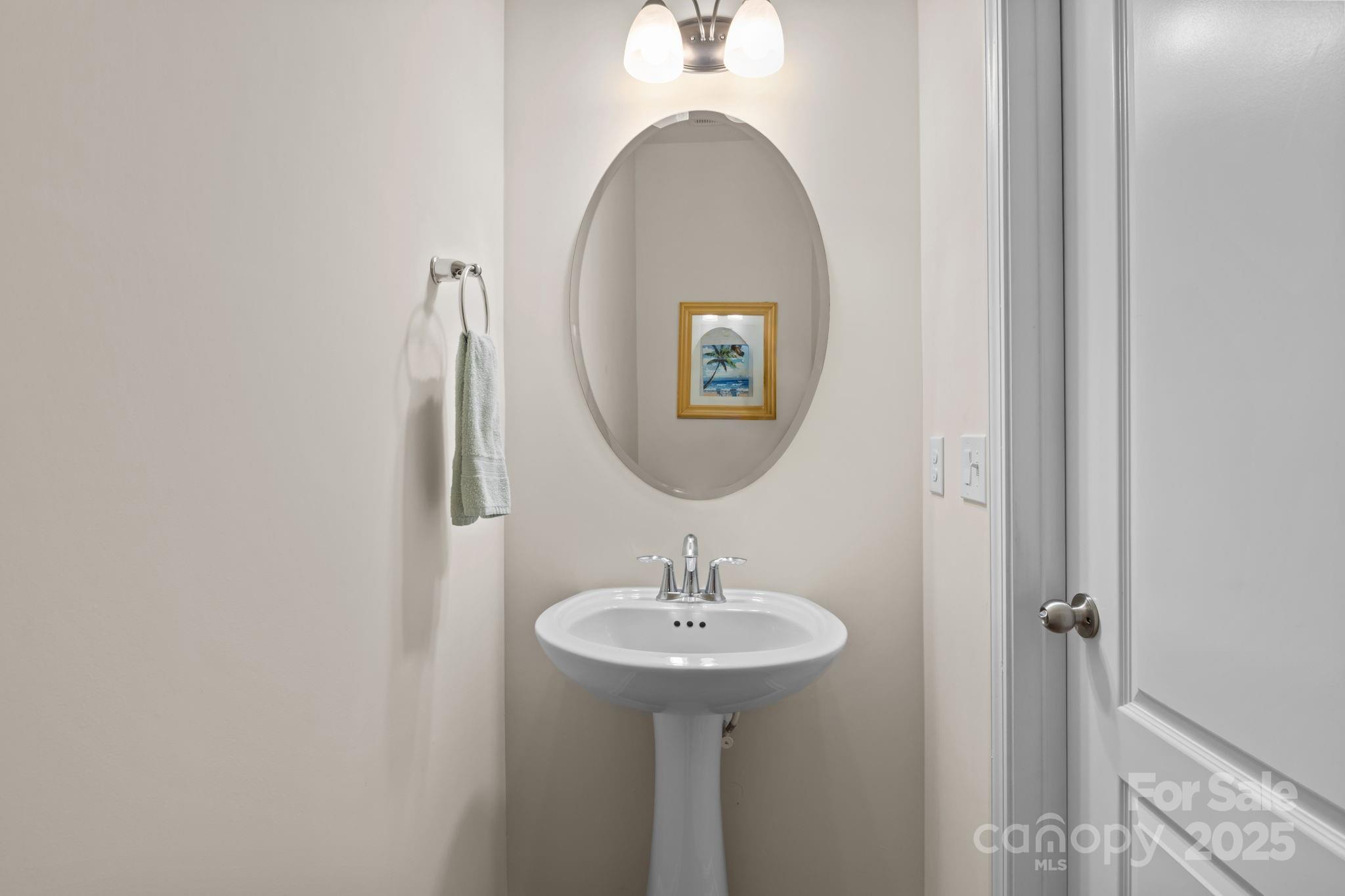 15925 Foreleigh Road Huntersville, NC 28078 - Photo 20 of 48 a bathroom with a sink and a mirror