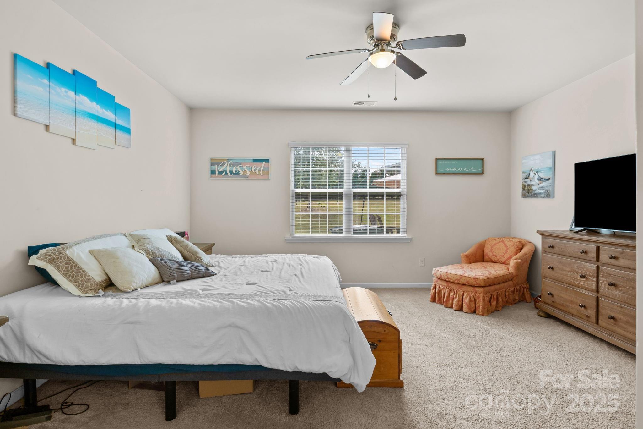 15925 Foreleigh Road Huntersville, NC 28078 - Photo 23 of 48 a bedroom with furniture and window