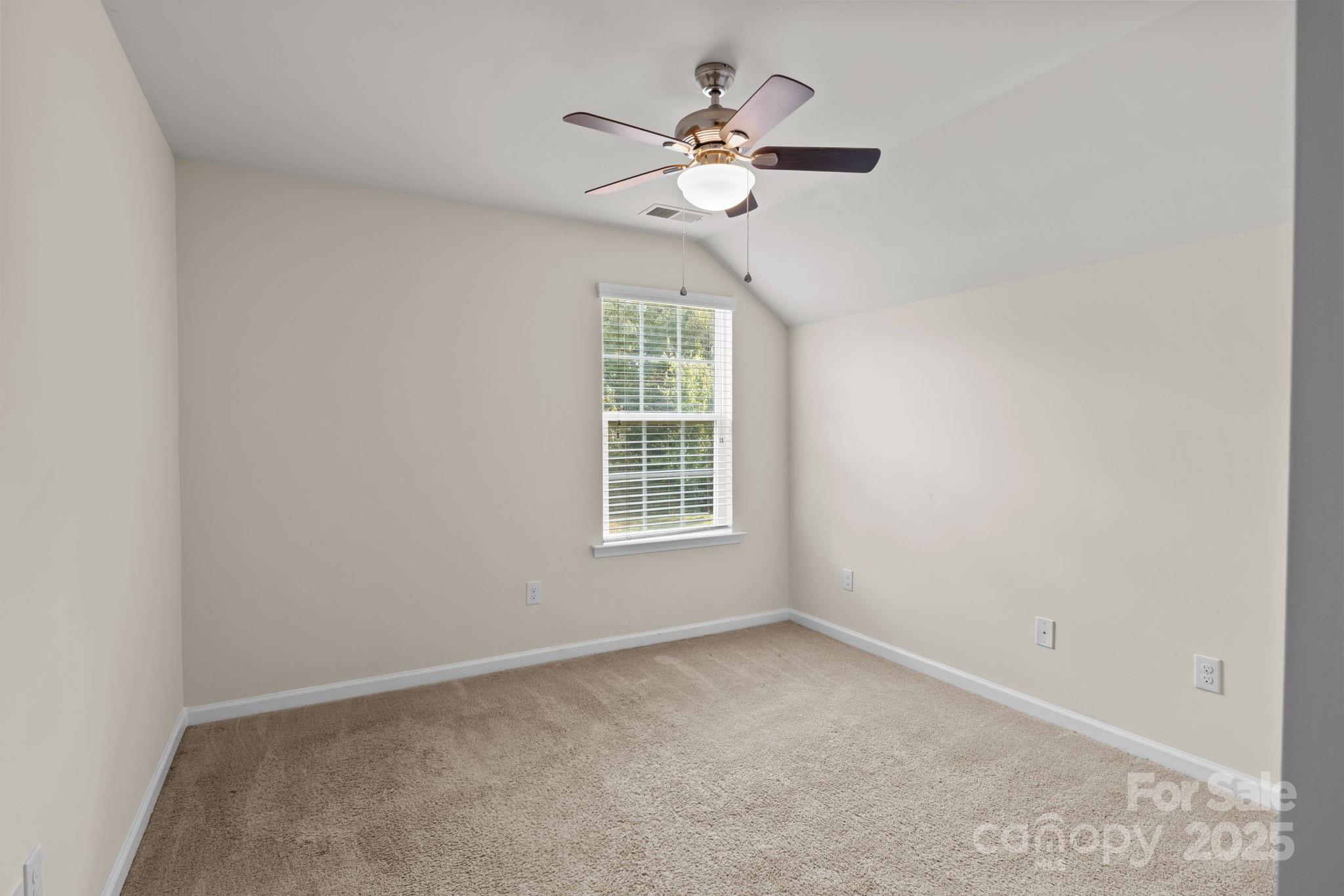 15925 Foreleigh Road Huntersville, NC 28078 - Photo 32 of 48 a view of an empty room with a window