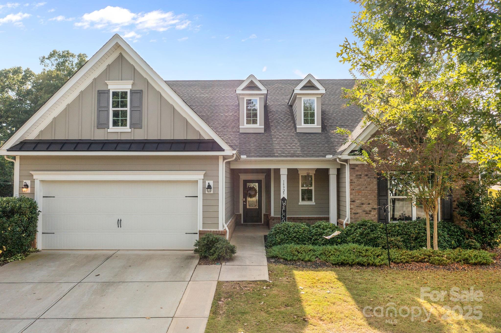 15925 Foreleigh Road Huntersville, NC 28078 - Photo 35 of 48 a front view of a house with garden
