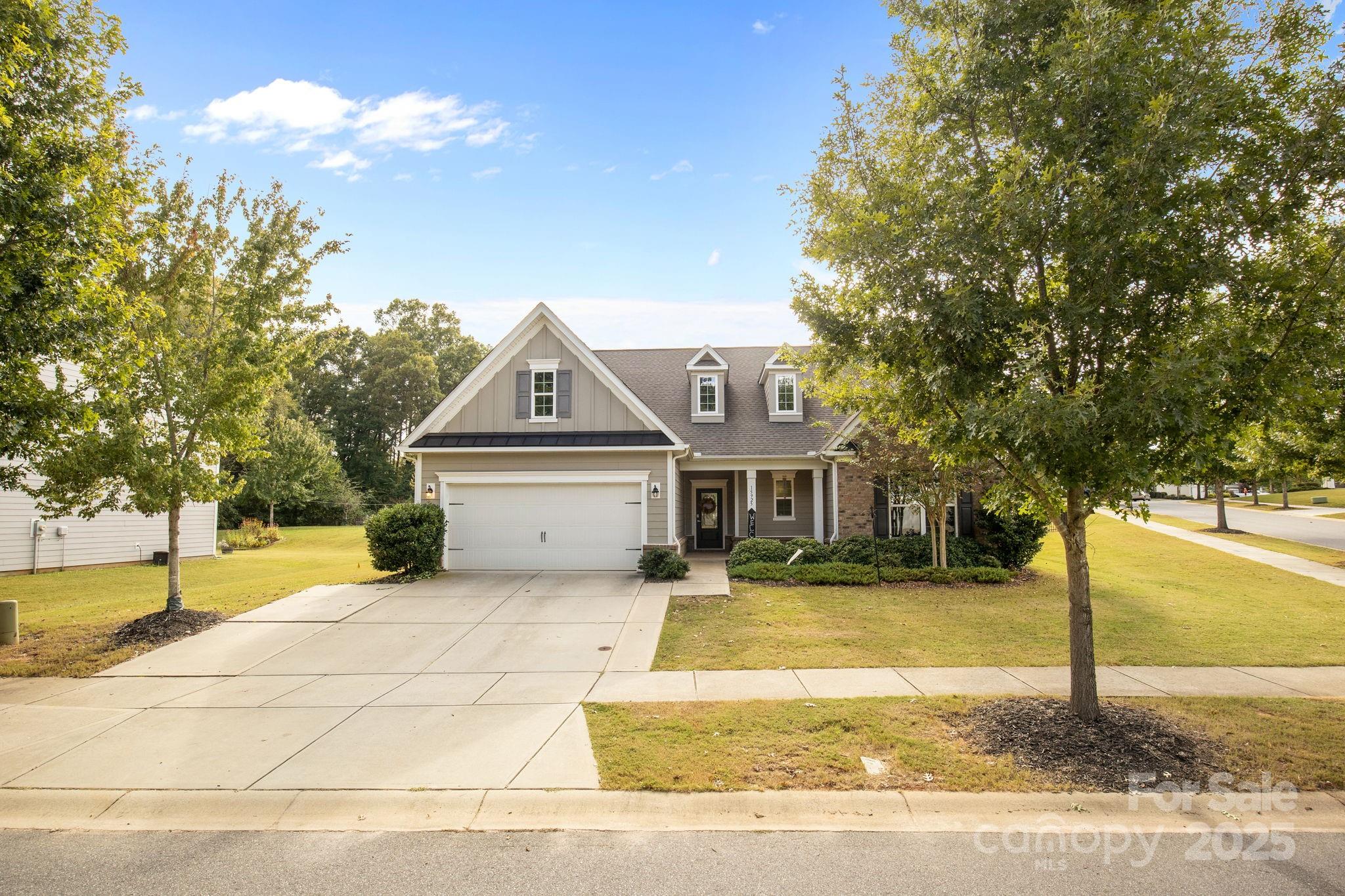 15925 Foreleigh Road Huntersville, NC 28078 - Photo 36 of 48 a view of a house with a patio
