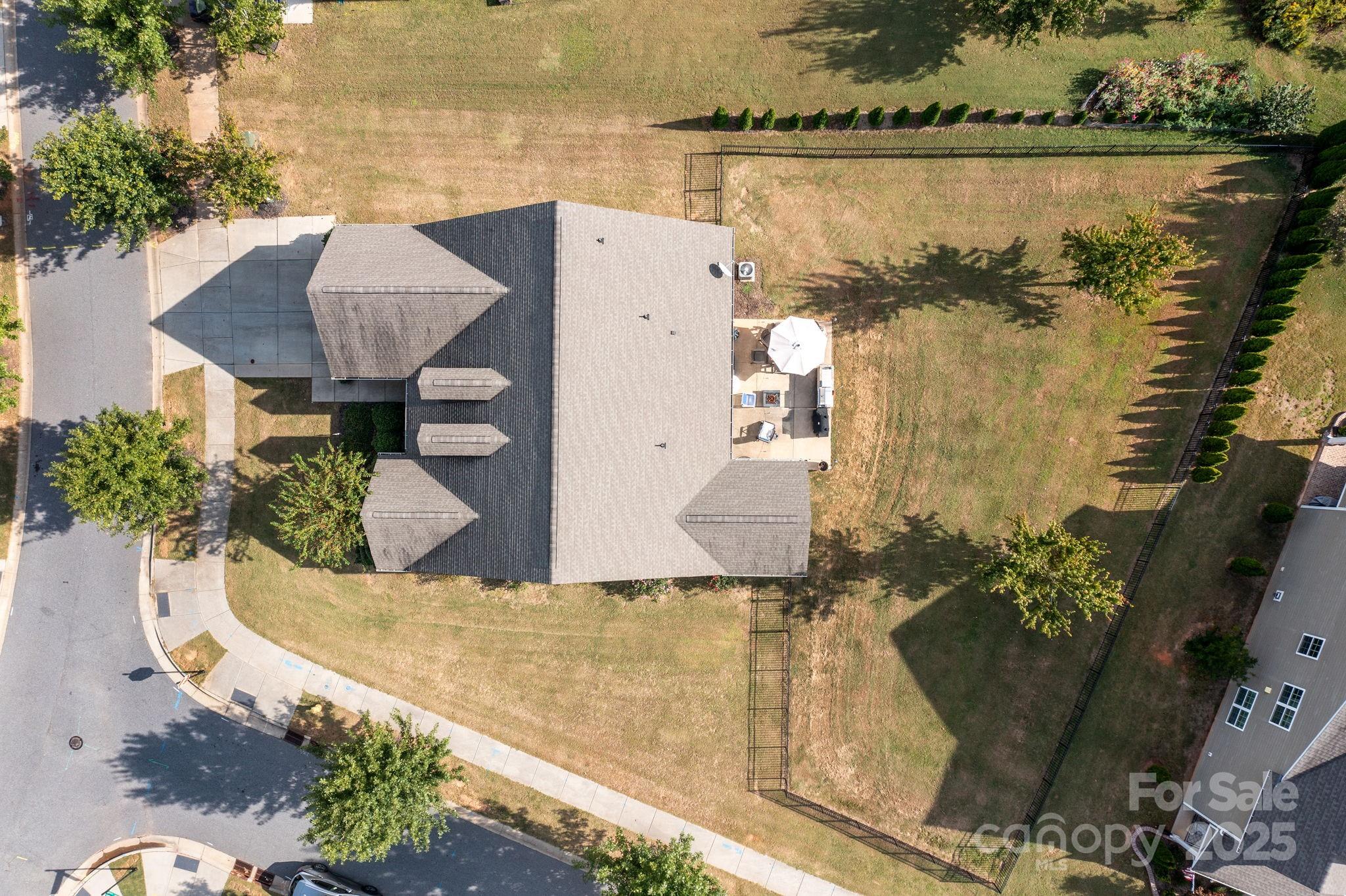 15925 Foreleigh Road Huntersville, NC 28078 - Photo 37 of 48 a terrace with outdoor seating and garden