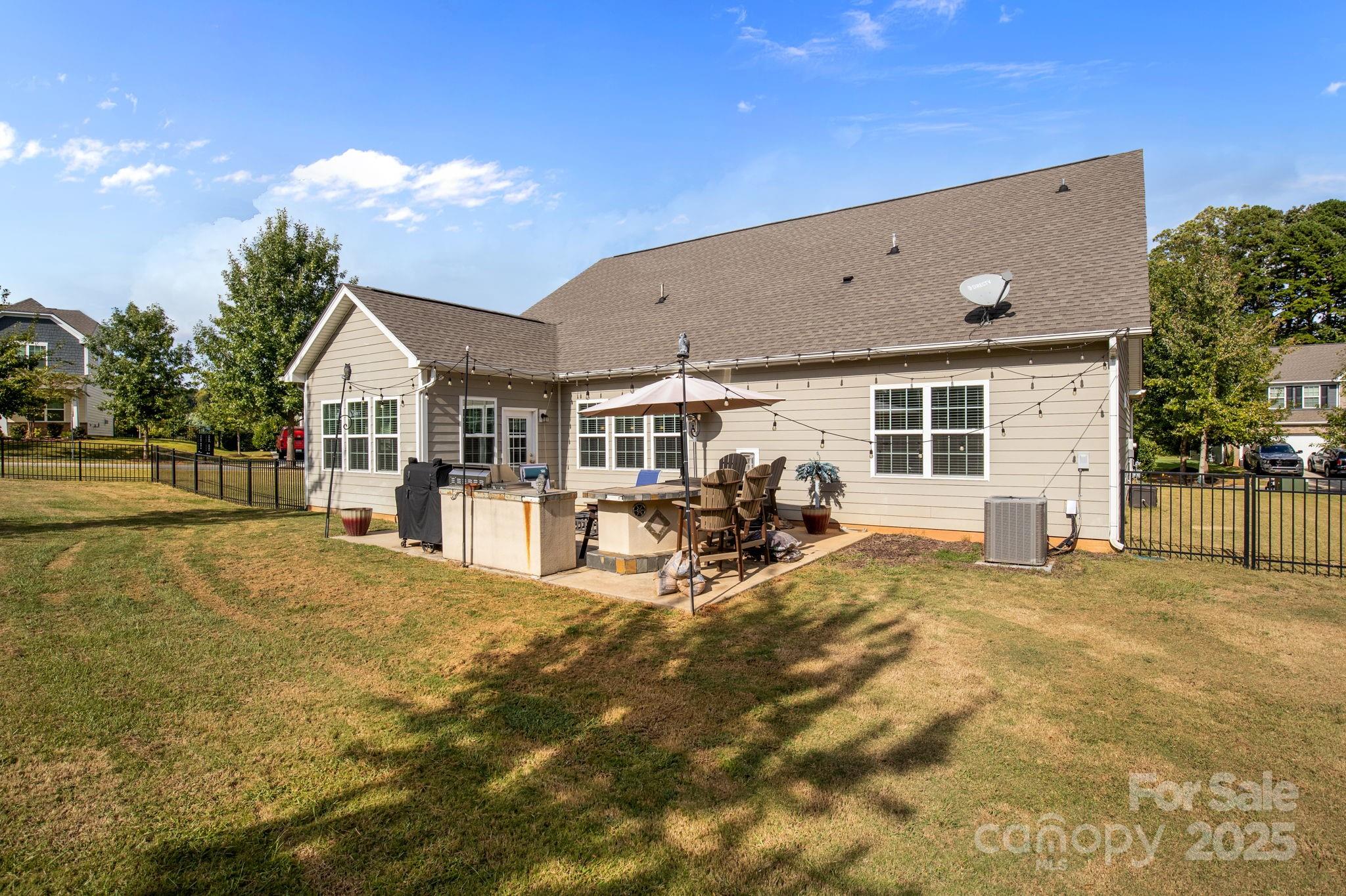 15925 Foreleigh Road Huntersville, NC 28078 - Photo 42 of 48 a view of a house with backyard porch and sitting area