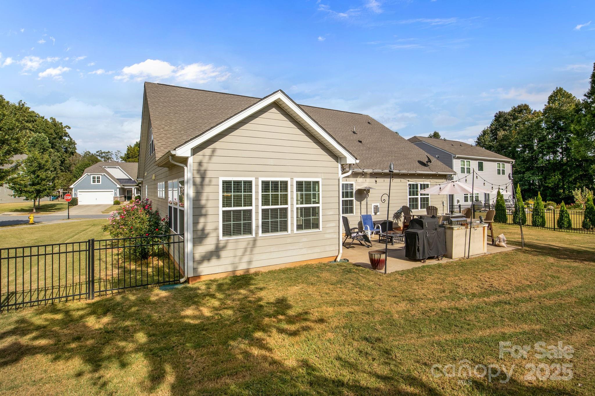 15925 Foreleigh Road Huntersville, NC 28078 - Photo 44 of 48 a view of a house with a patio