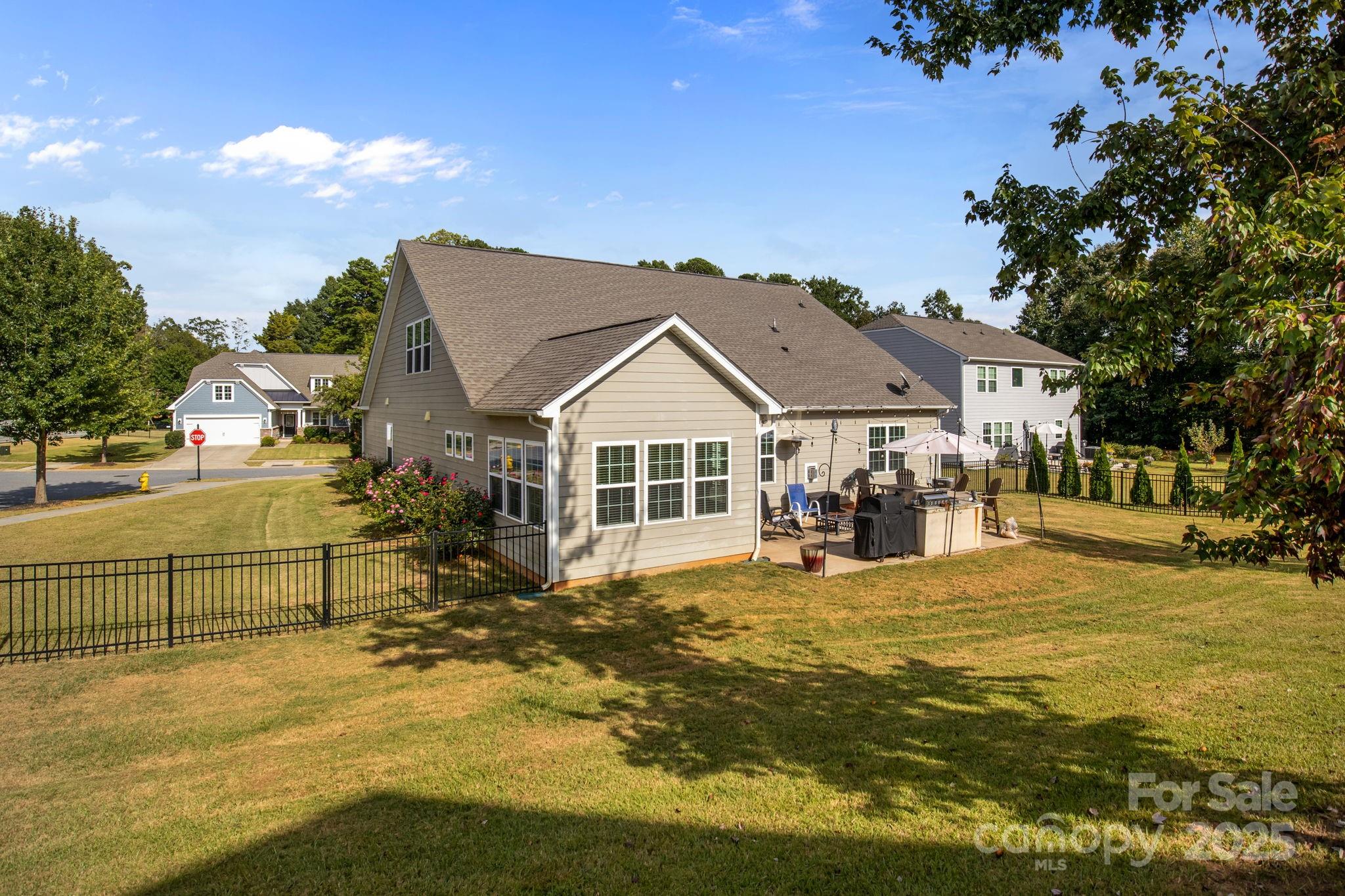 15925 Foreleigh Road Huntersville, NC 28078 - Photo 45 of 48 a view of a house with yard and sitting area
