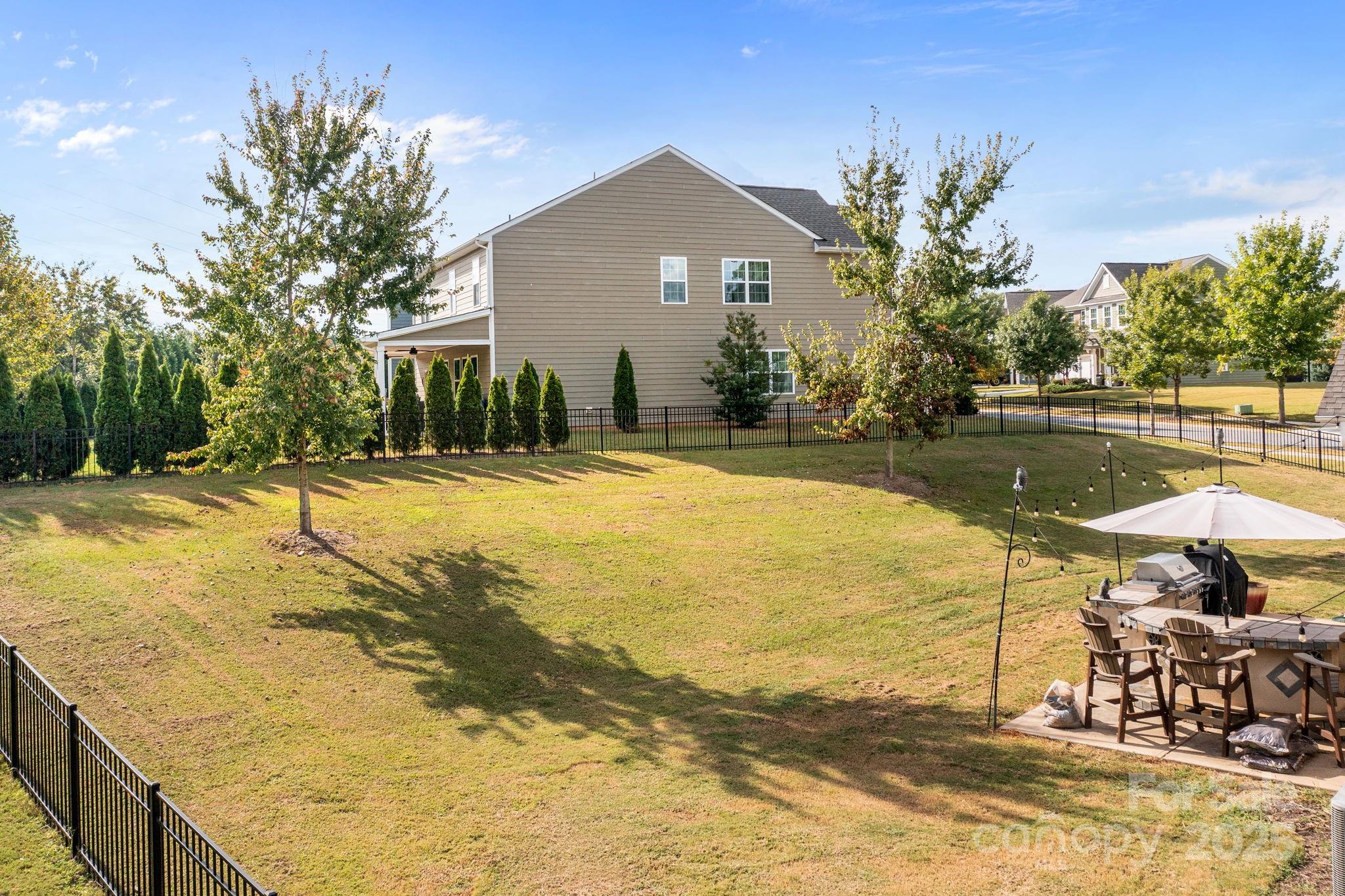 15925 Foreleigh Road Huntersville, NC 28078 - Photo 46 of 48 a front view of house with yard and lake view