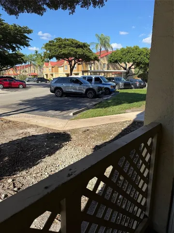 a view of a lake from a balcony