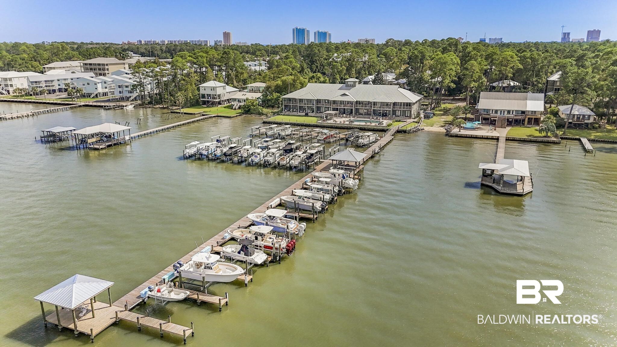 25773 Canal Road Orange Beach, AL 36561 - Photo 18 of 32 Aerial view of a nearby body of water and numerous boat docks