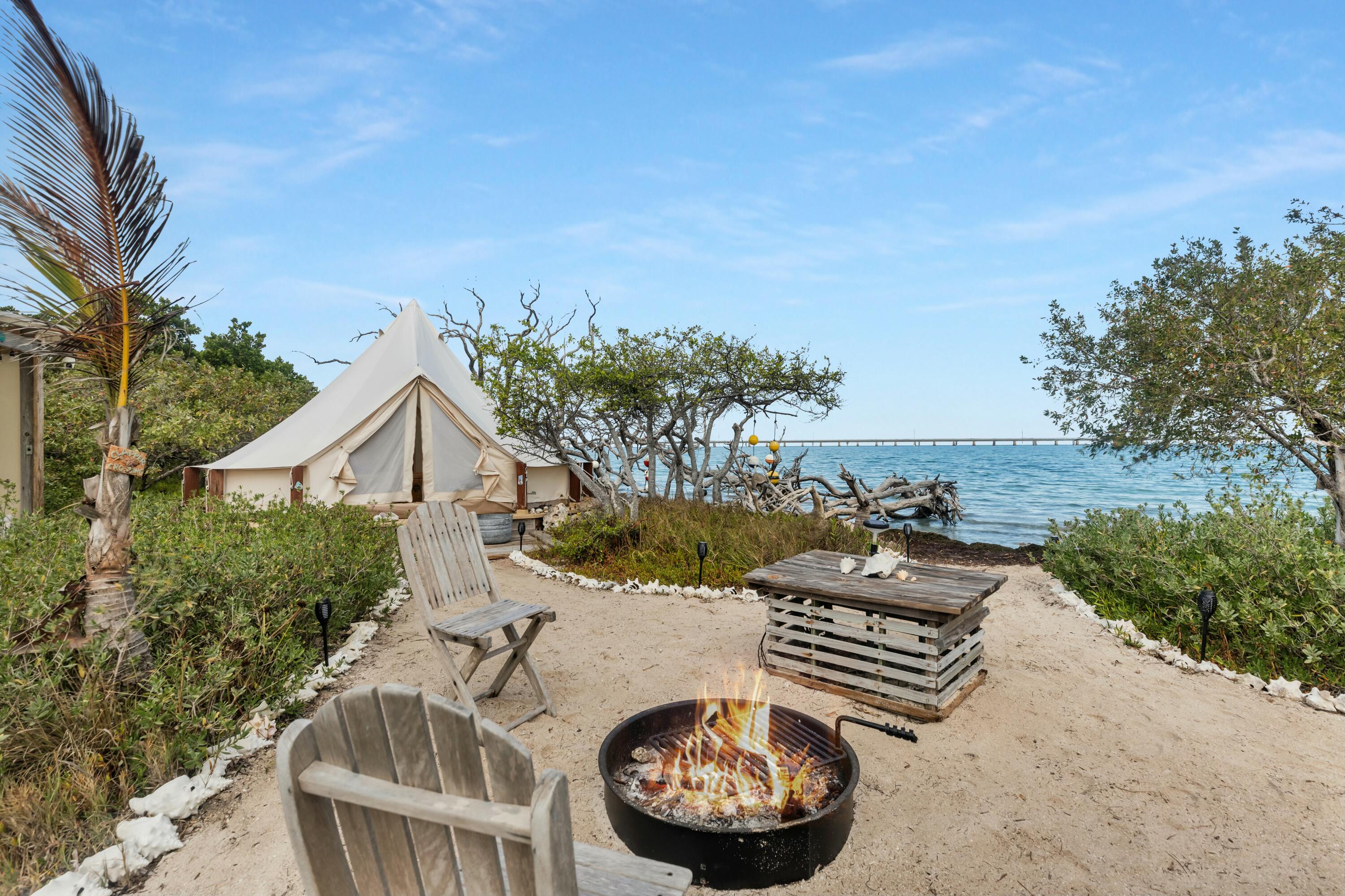 Molasses Keys Marathon, FL 33050 - Photo 5 of 36 a view of a backyard with plants and lake view