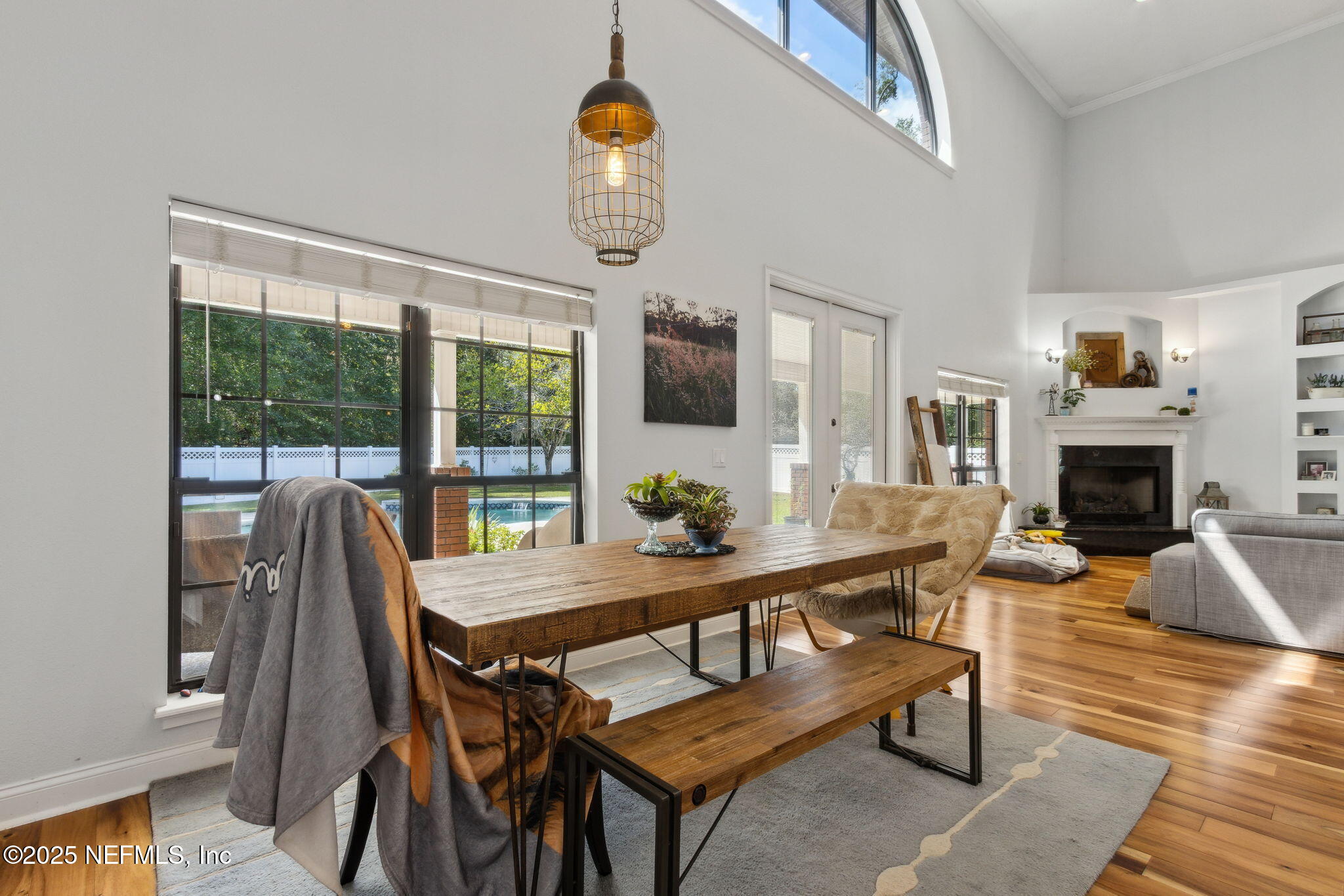 87377 Raddin Road Yulee, FL 32097 - Photo 31 of 75 a view of a livingroom with furniture window and wooden floor
