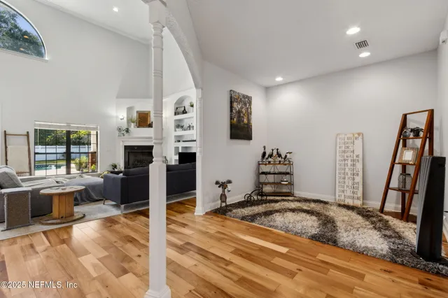 a bedroom with a bed and flat screen tv