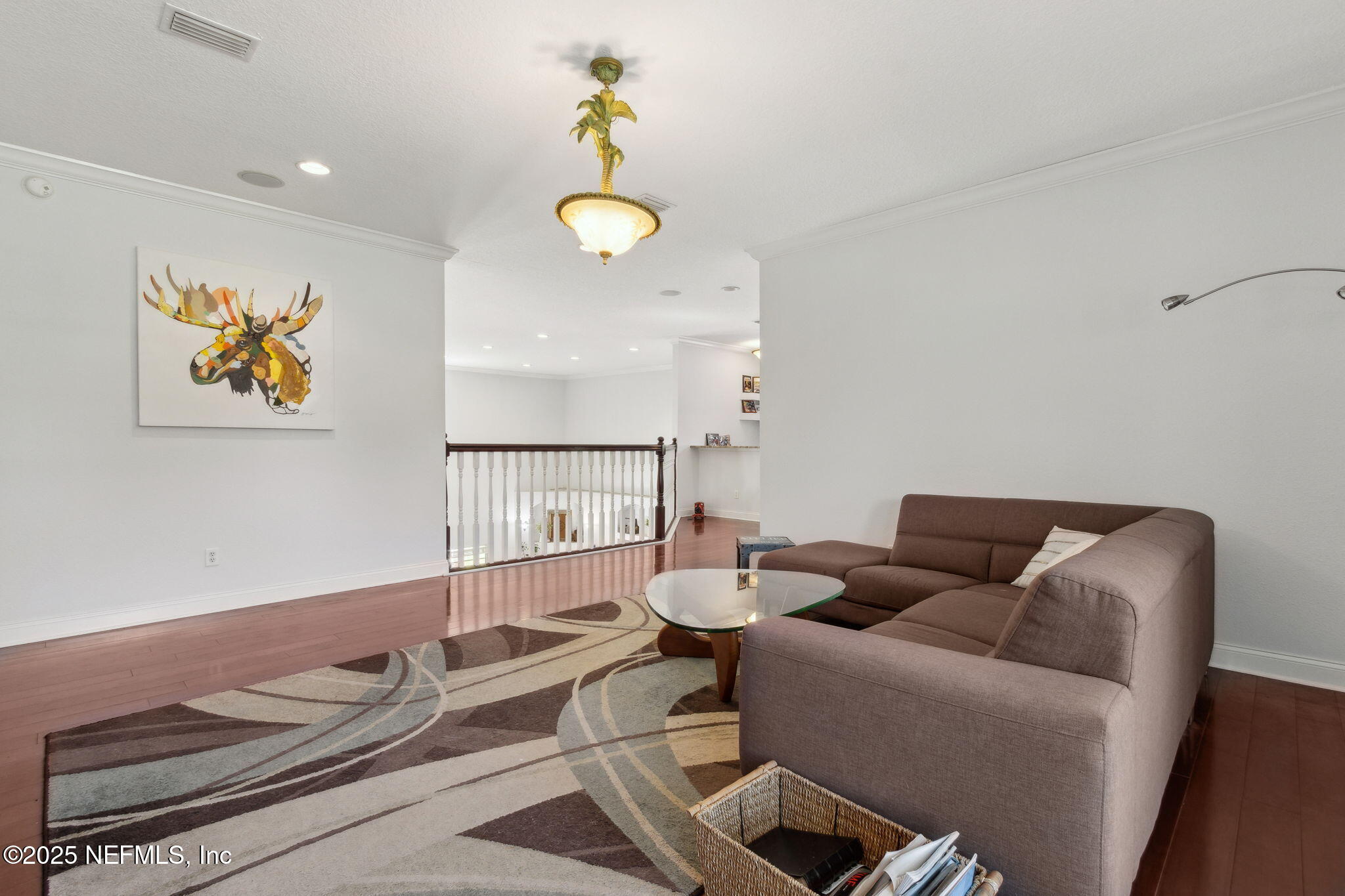 87377 Raddin Road Yulee, FL 32097 - Photo 51 of 75 a living room with furniture and wooden floor