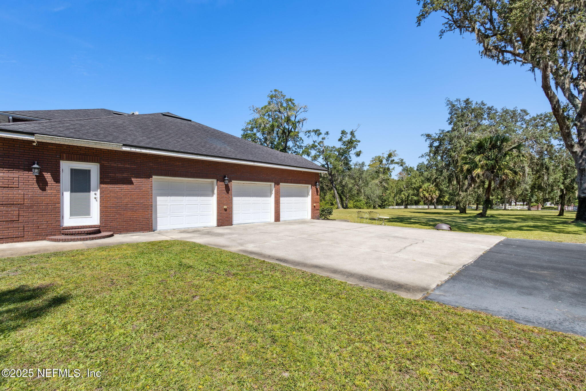 87377 Raddin Road Yulee, FL 32097 - Photo 72 of 75 a house view with a garden space