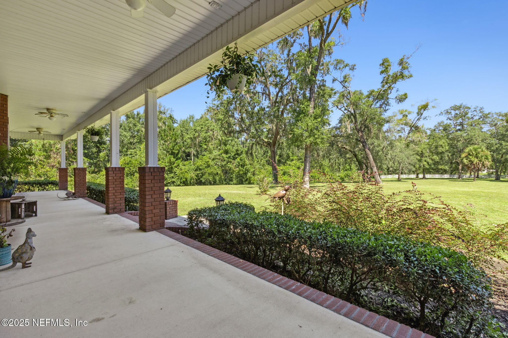 87377 Raddin Road Yulee, FL 32097 - Photo 10 of 75 a view of a garden with an outdoor space