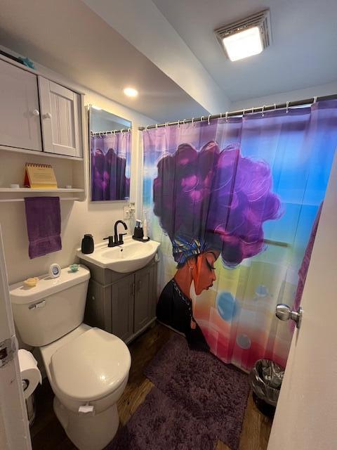 1417 Earl Road Michigan City, IN 46360 - Photo 16 of 25 a bathroom with a toilet sink and mirror