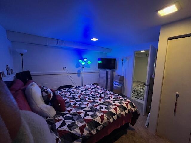 1417 Earl Road Michigan City, IN 46360 - Photo 21 of 25 a bedroom with a bed and a view of bathroom