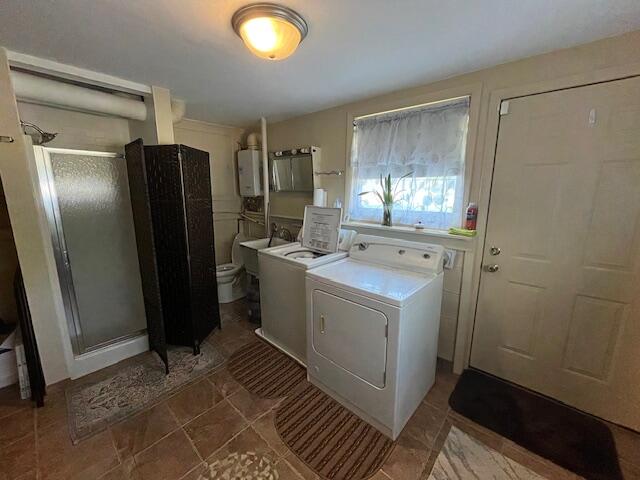 1417 Earl Road Michigan City, IN 46360 - Photo 22 of 25 a utility room with a sink a washer and dryer