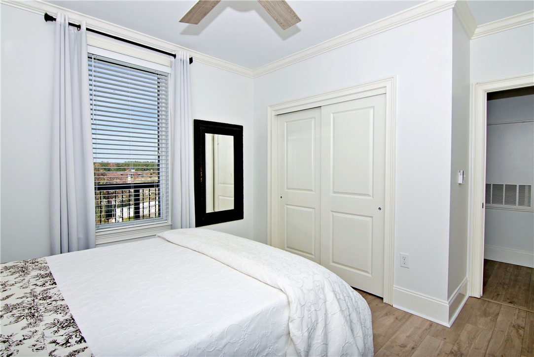 601 Watermarke Lane Anderson, SC 29625 - Photo 13 of 25 This bright bedroom features a window with a pleasant view and ample closet space.
