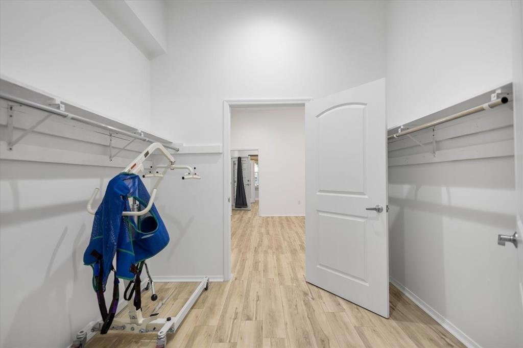 6990 Pin Oak Road Big Sandy, TX 75755 - Photo 17 of 40 a view of a room with wooden floor and stairs