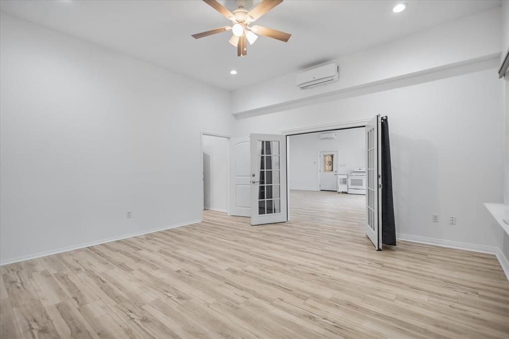 6990 Pin Oak Road Big Sandy, TX 75755 - Photo 23 of 40 a view of empty room with wooden floor