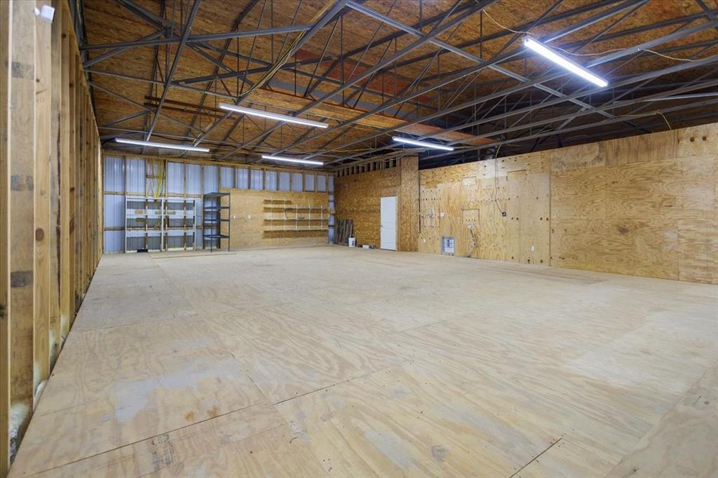 6990 Pin Oak Road Big Sandy, TX 75755 - Photo 28 of 40 a view of an empty room with a garage