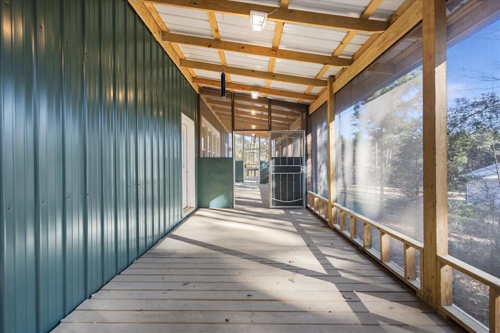 6990 Pin Oak Road Big Sandy, TX 75755 - Photo 32 of 40 a view of balcony with staircase