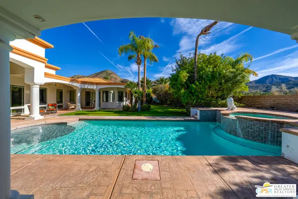 a view of a house with a swimming pool