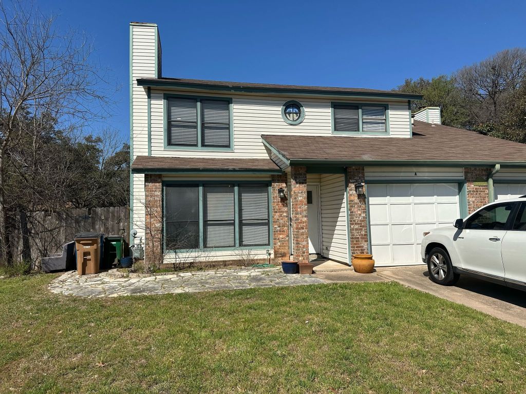 5009 Cana Cove, Unit A Austin, TX 78749 - Photo 1 of 22 a view of a house with a patio