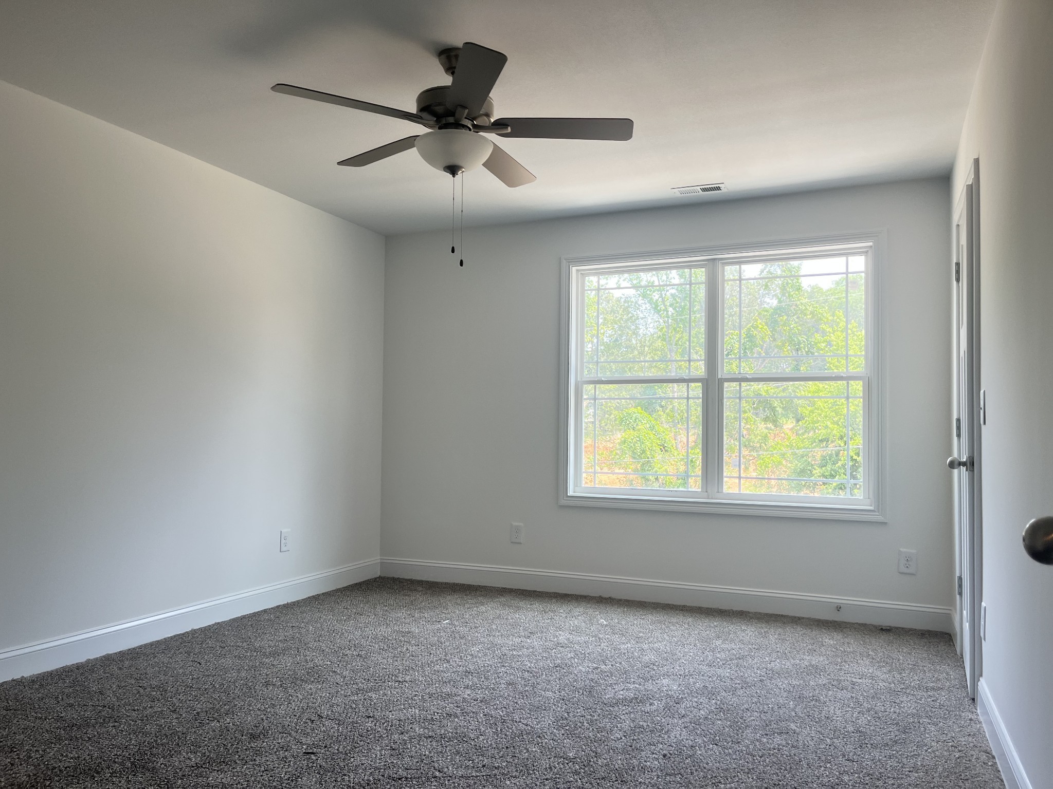 48 Cave Springs Road, Unit LOT 4 Clarksville, TN 37042 - Photo 6 of 12 an empty room with a window