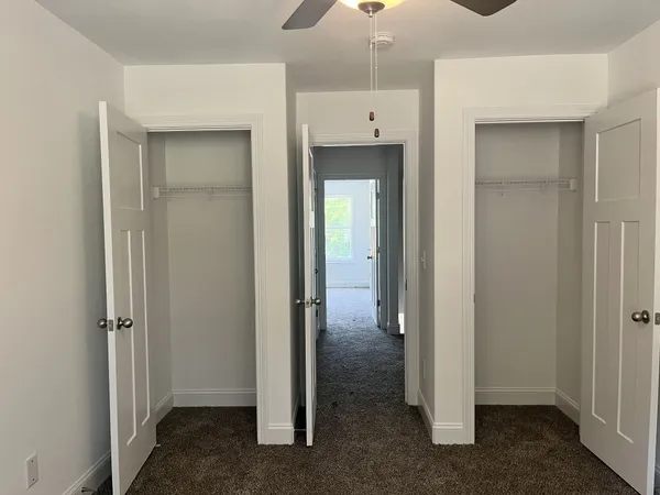 a view of a bathroom with a glass shower door