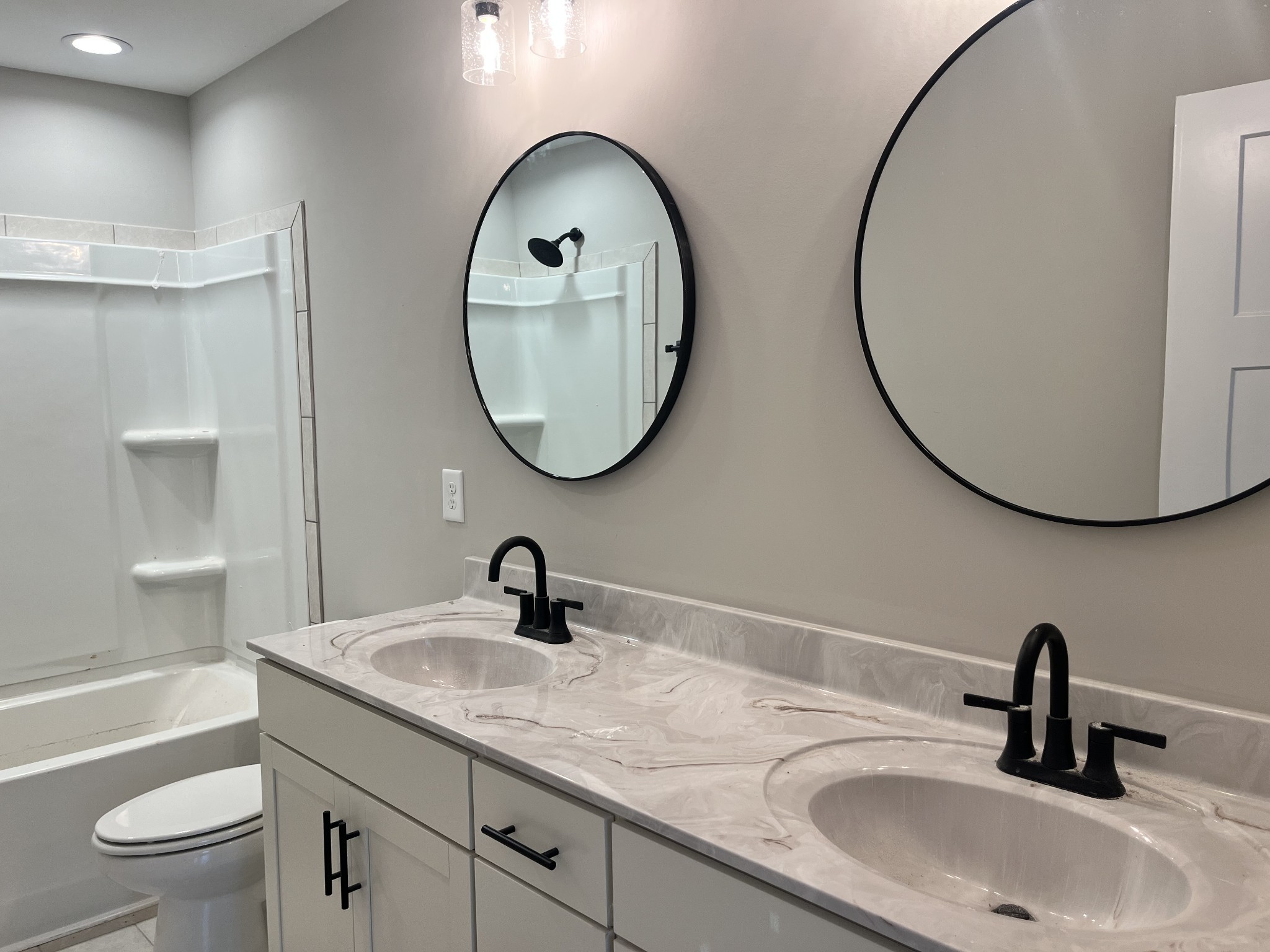 48 Cave Springs Road, Unit LOT 4 Clarksville, TN 37042 - Photo 8 of 12 a bathroom with a sink and a mirror