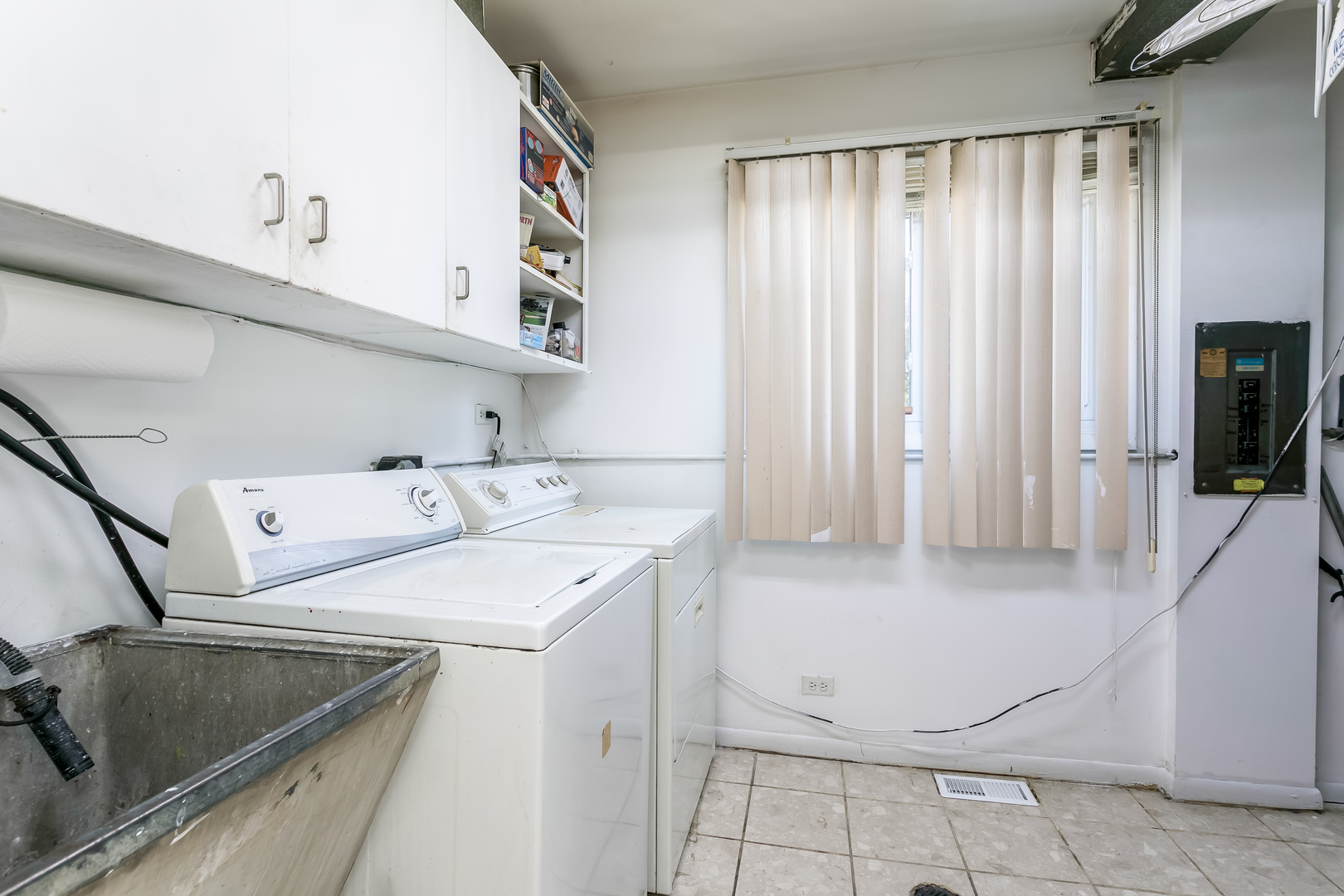 3729 Roth Terrace Skokie, IL 60076 - Photo 22 of 27 a utility room with dryer and washer