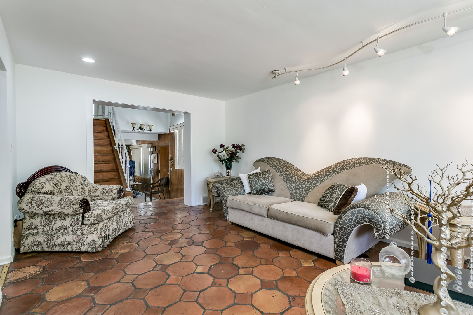 3729 Roth Terrace Skokie, IL 60076 - Photo 5 of 27 a living room with furniture and a couch