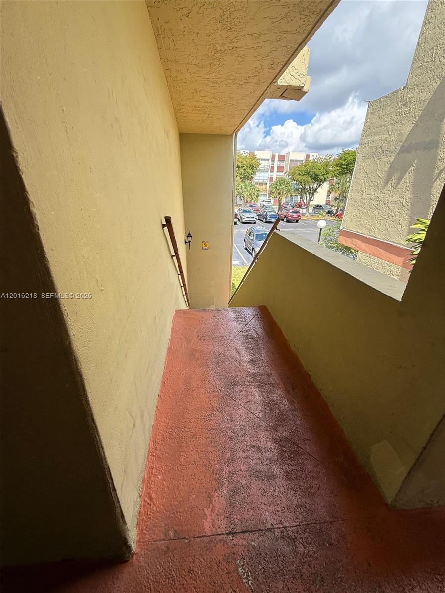 9321 Southwest 4th Street, Unit 230C Miami, FL 33174 - Photo 1 of 37 a view of balcony with furniture