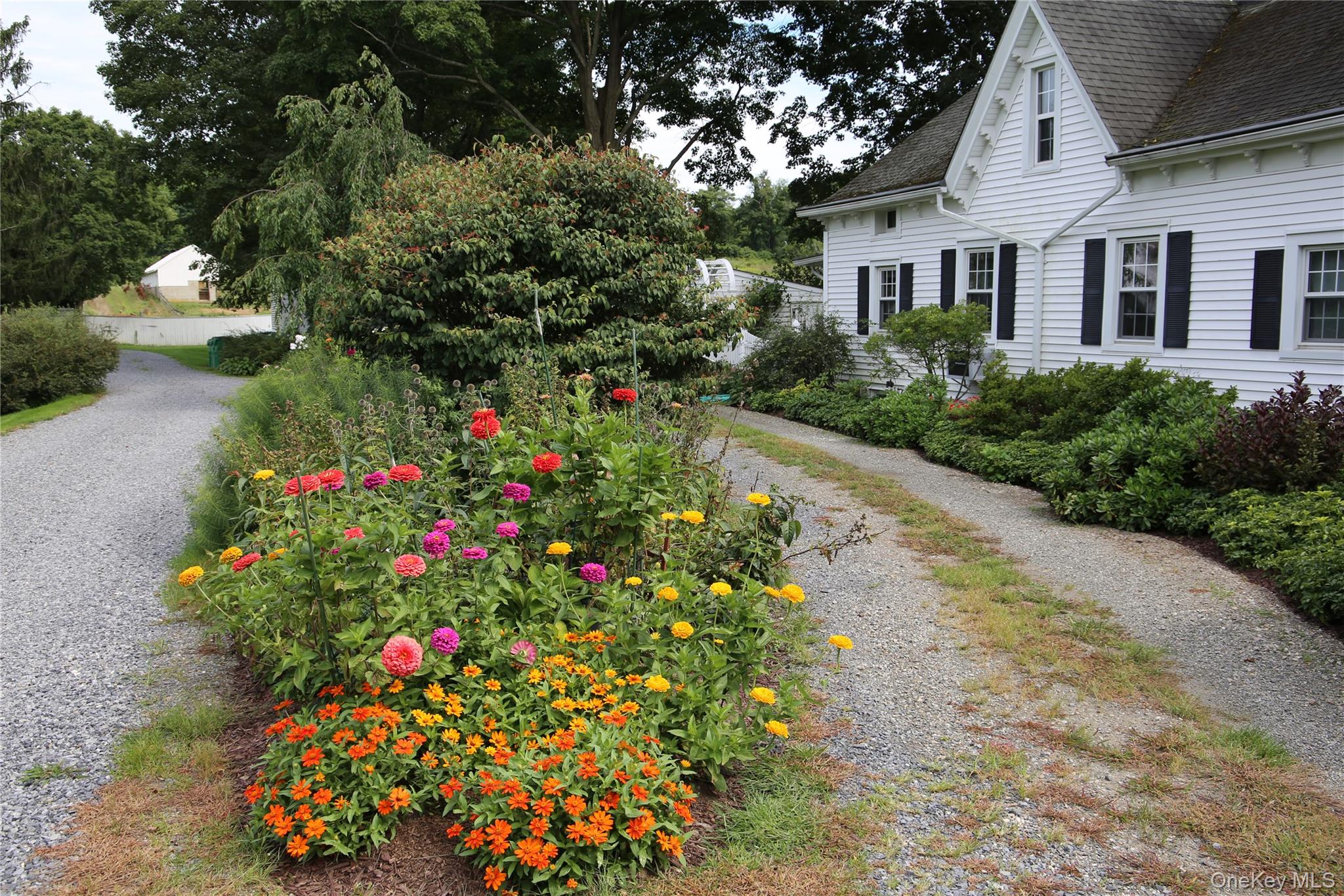 1196 82nd Route Hopewell Junction, NY 12533 - Photo 16 of 17 a front view of a house with a yard and fountain