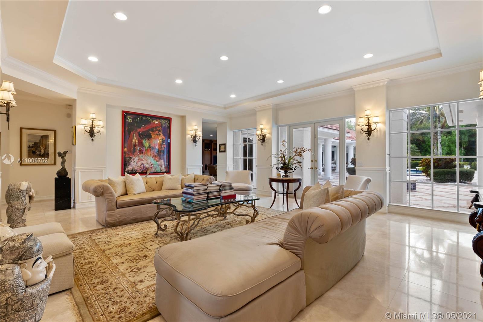 2920 Luckie Road Weston, FL 33331 - Photo 12 of 60 a living room with furniture and a large window