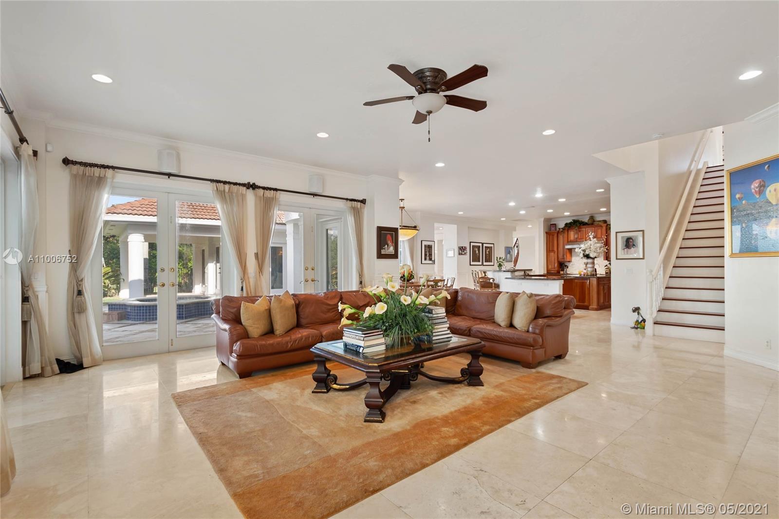 2920 Luckie Road Weston, FL 33331 - Photo 19 of 60 a living room with furniture and a large window