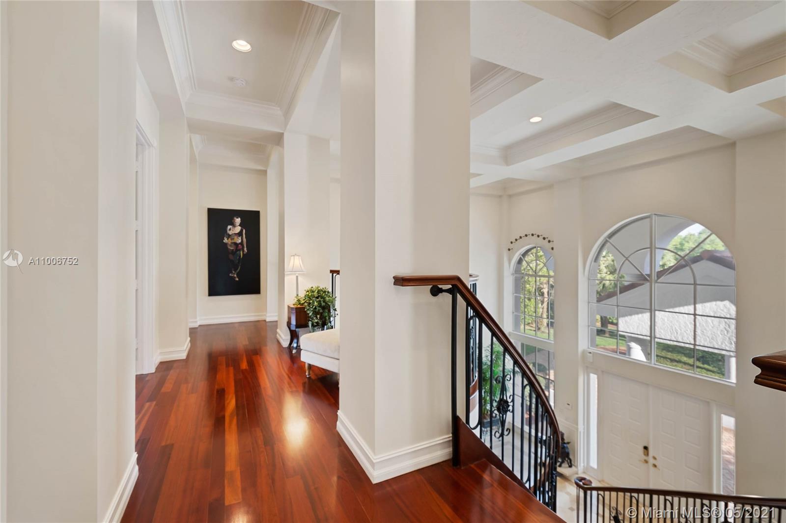 2920 Luckie Road Weston, FL 33331 - Photo 20 of 60 a view of entryway with wooden floor and stairs
