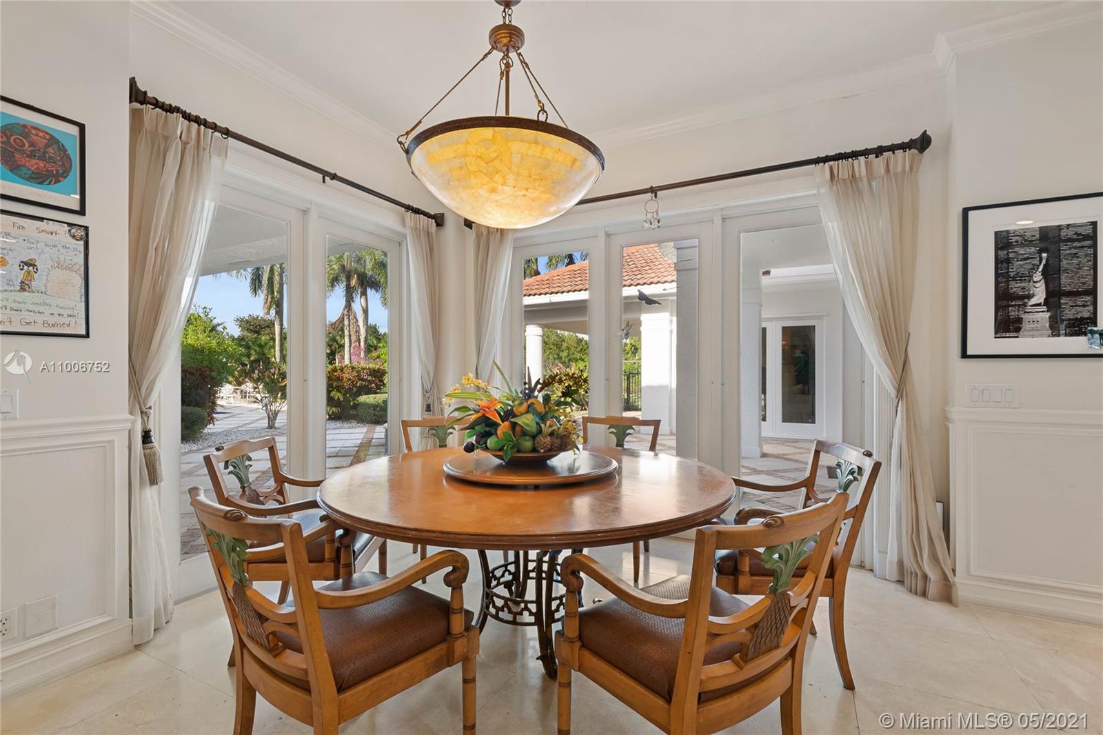2920 Luckie Road Weston, FL 33331 - Photo 27 of 60 a dining room with furniture and window