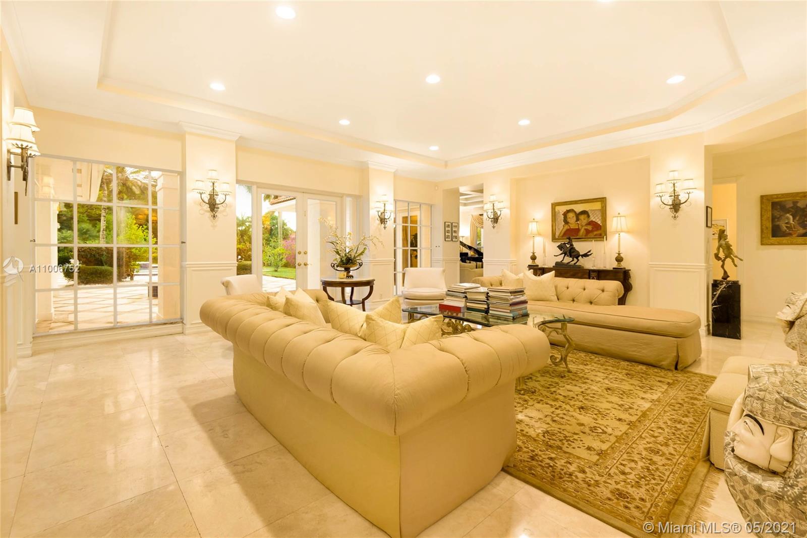 2920 Luckie Road Weston, FL 33331 - Photo 28 of 60 a living room with furniture and a large window