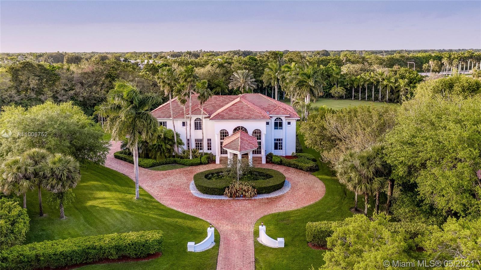2920 Luckie Road Weston, FL 33331 - Photo 30 of 60 a swimming pool with outdoor seating and yard