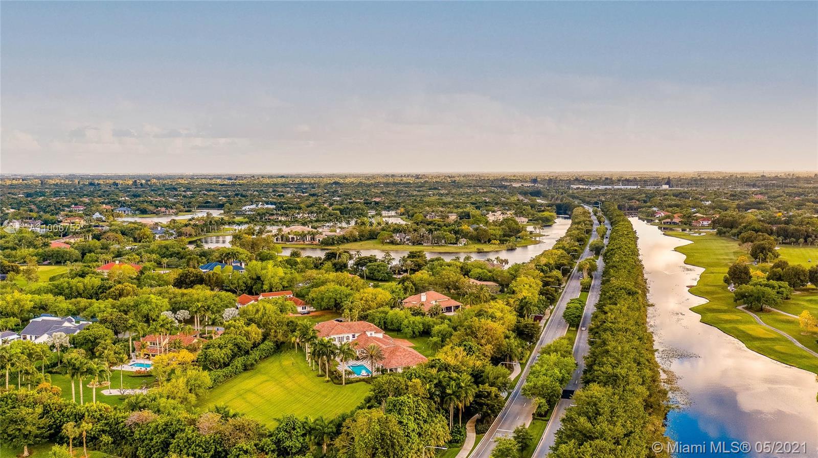 2920 Luckie Road Weston, FL 33331 - Photo 34 of 60 an aerial view of residential houses with outdoor space and trees