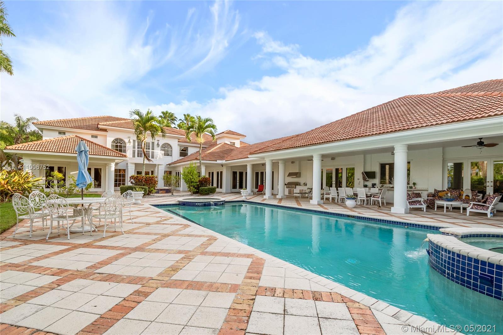2920 Luckie Road Weston, FL 33331 - Photo 38 of 60 a view of a house with swimming pool and sitting area