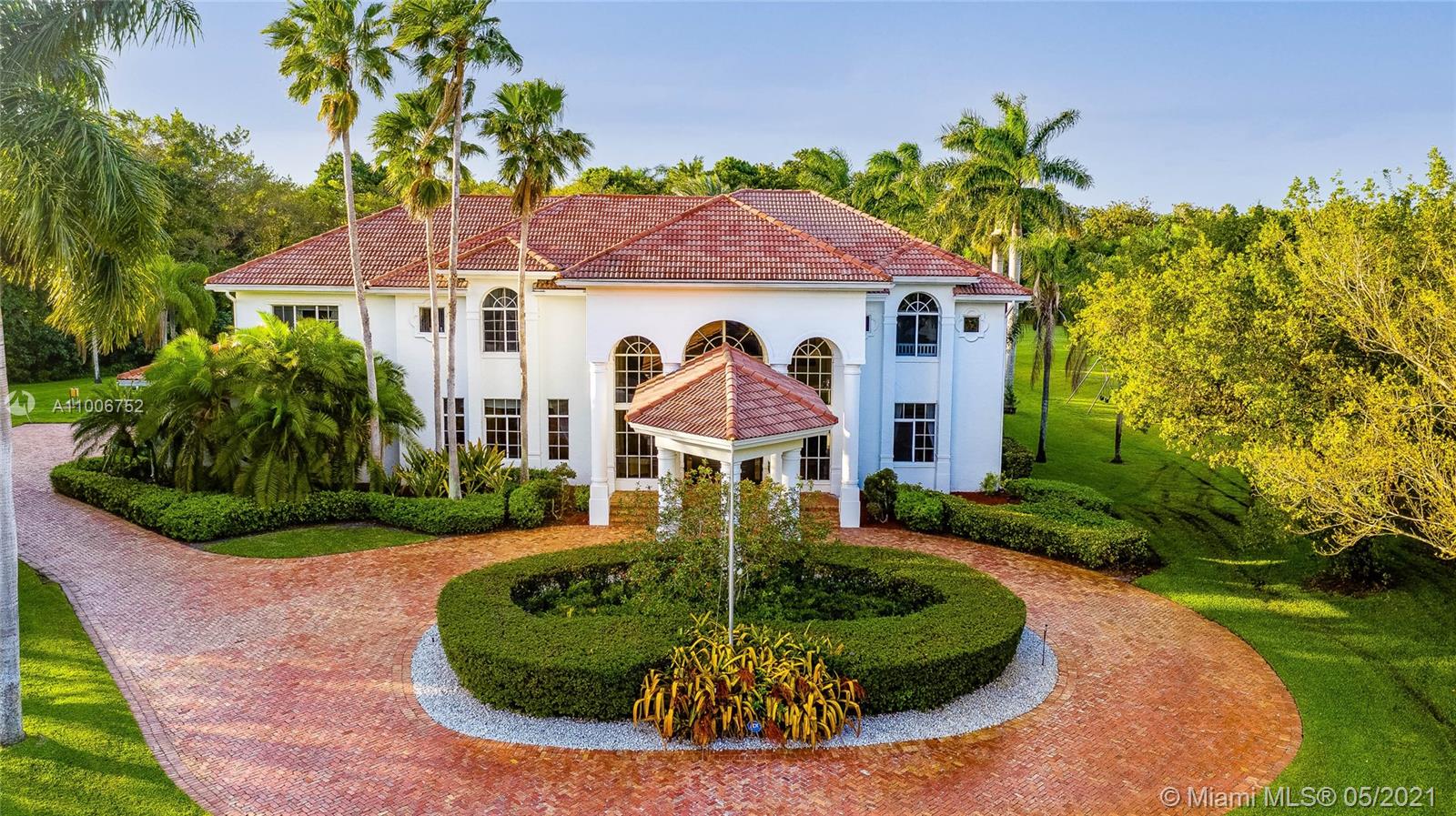 2920 Luckie Road Weston, FL 33331 - Photo 53 of 60 a front view of a house with a yard