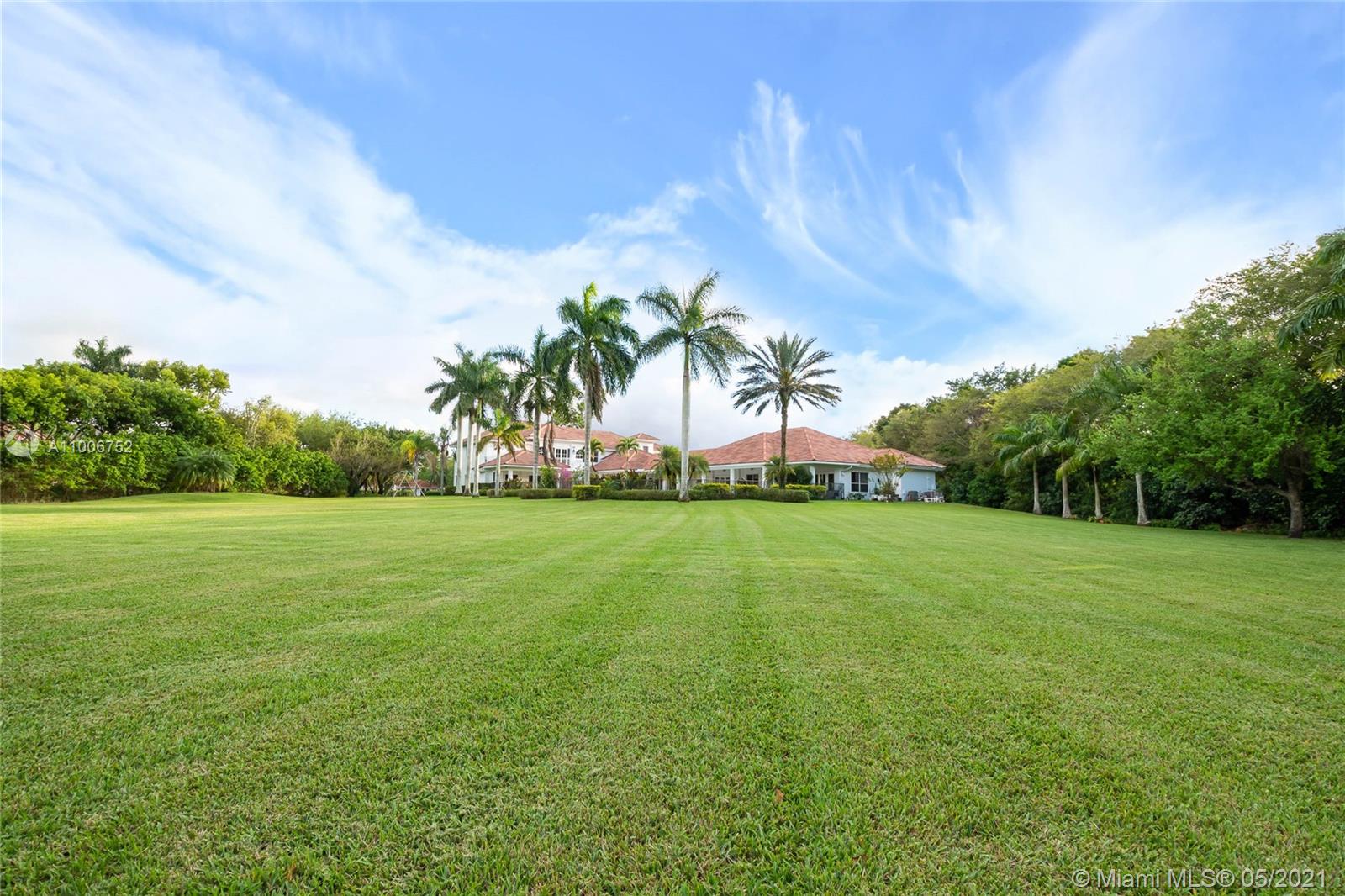 2920 Luckie Road Weston, FL 33331 - Photo 58 of 60 a view of a field of grass and trees