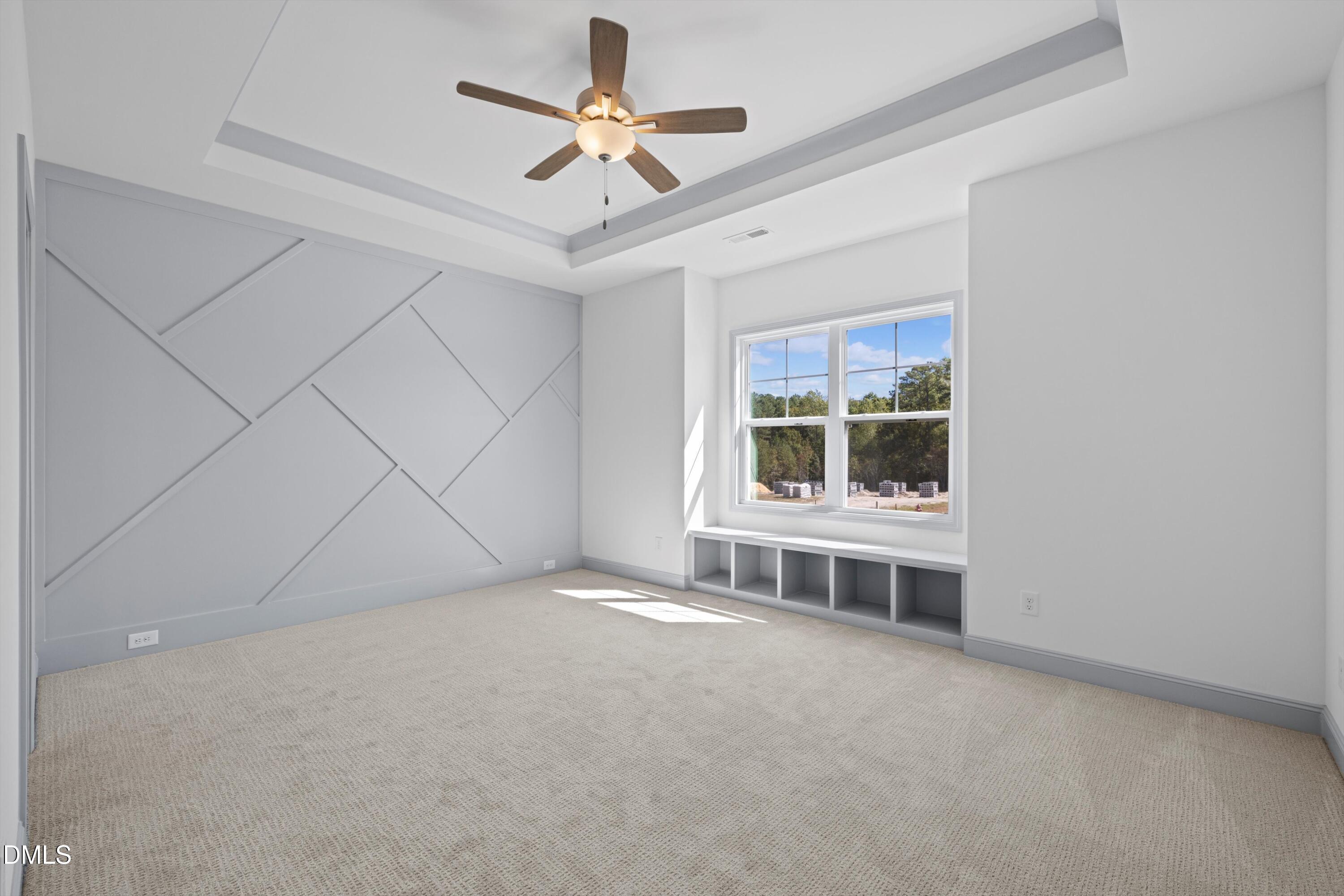 73 Falls Riv Court Broadway, NC 27505 - Photo 12 of 39 an empty room with windows and fan