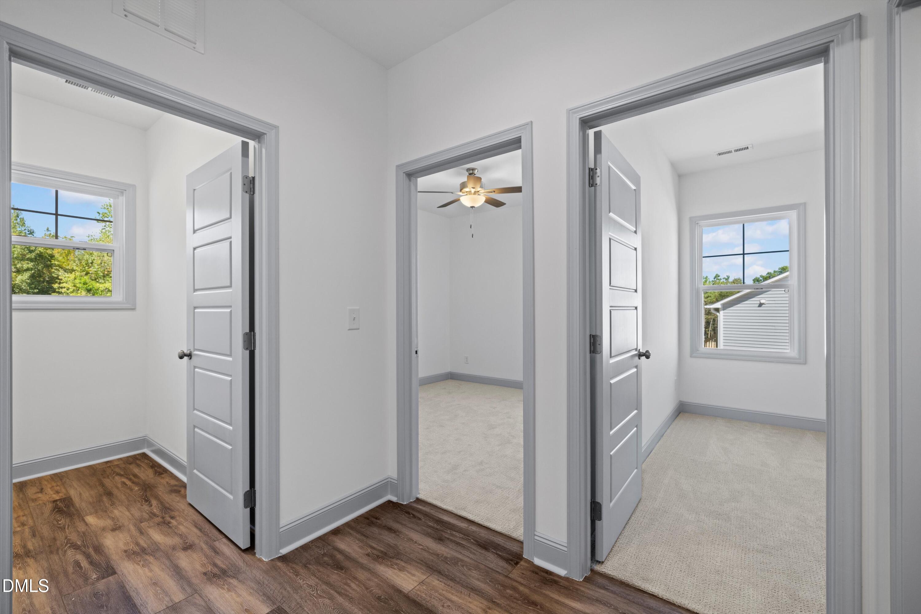 73 Falls Riv Court Broadway, NC 27505 - Photo 27 of 39 a view of a hallway with wooden floor and closet