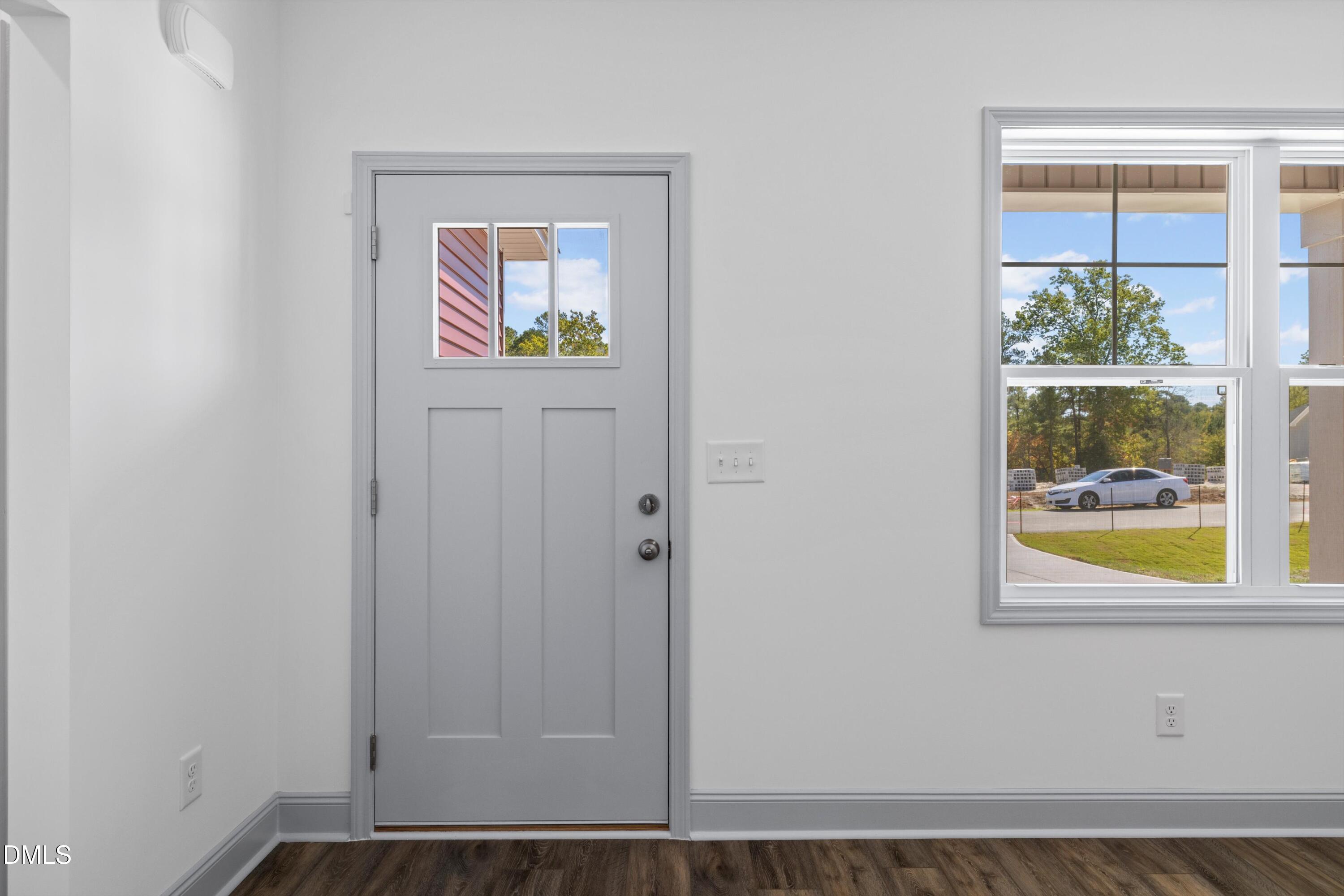 73 Falls Riv Court Broadway, NC 27505 - Photo 6 of 39 a view of an entryway with wooden floor